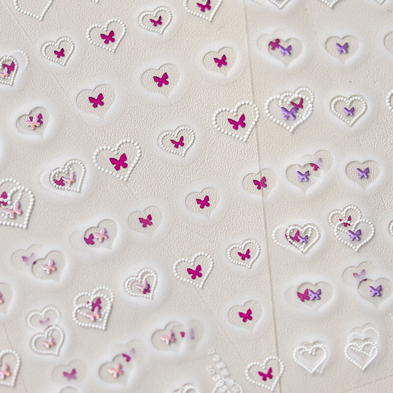 Close-up of Heart Nail Stickers - Charming small butterflies