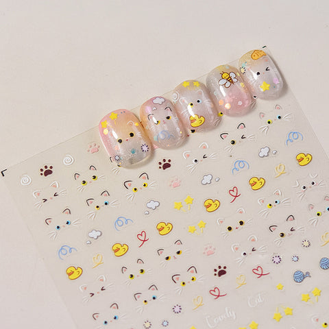 Cat-themed nail art featuring our unique emoji designs
